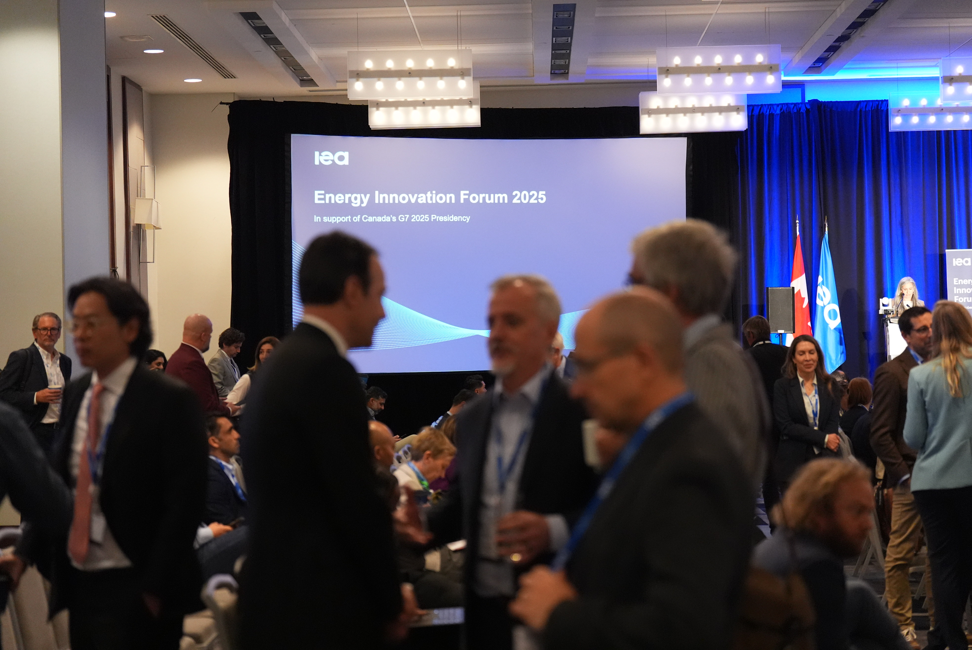 People chatting during networking break.  