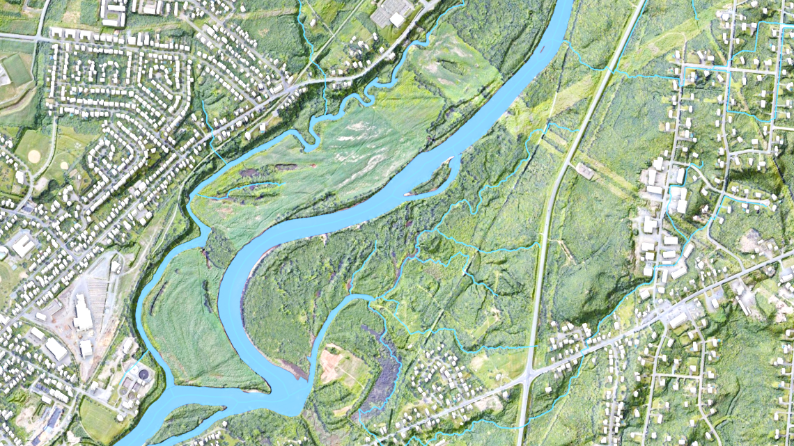 Une carte montrant une rivière traversant des quartiers.
