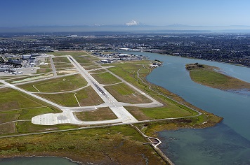 Aerial photo showing the close proximity of the Vancouver International Airport to the Fraser River. Photo credit: Josef Hanus (Thinkstock: 154420349)