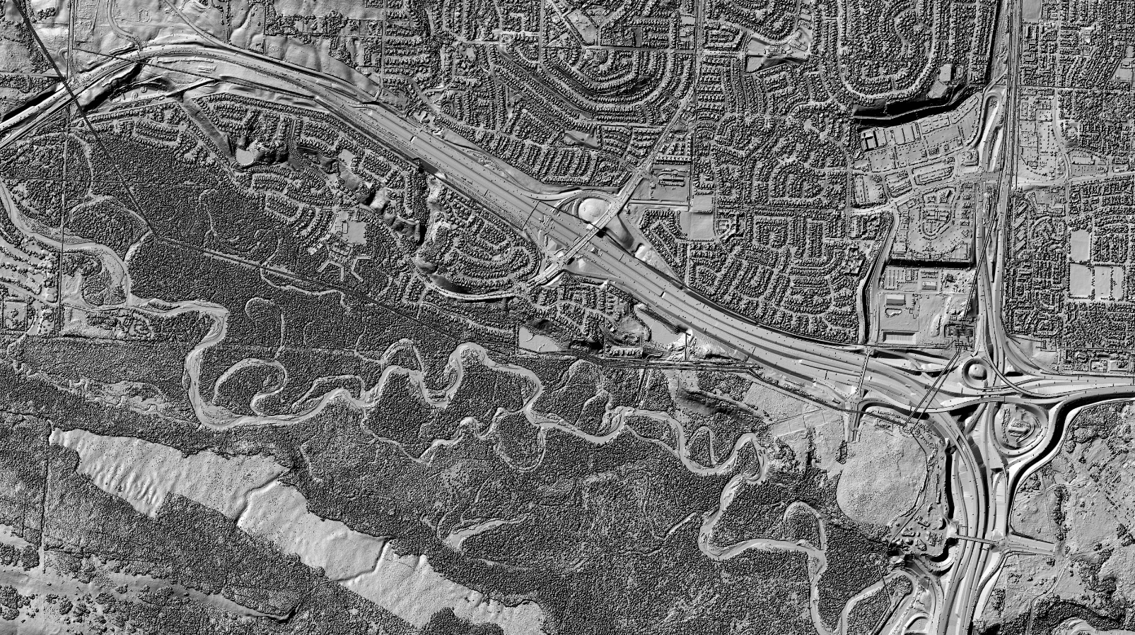  Reliefs 3D ombrés du Modèle numérique de surface (Image du haut) et du Modèle numérique de terrain (Image du bas) couvrant un secteur de la ville de Calgary, AB.